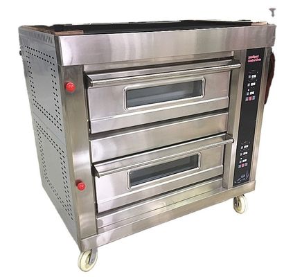 파이 롱 로프 베이커리 에서 대형 오븐 머신 으로 원통 코코넛 빵 을 구하기 쉽다