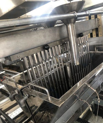 8000x2100x2100mm 붓기 속도 15-30 n/min 평평한 하드 롤리팝용 과자 생산 라인